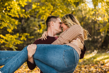 Couple Embracing In Park