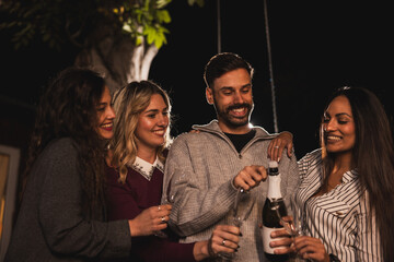 Cheerful Friends Open Champagne