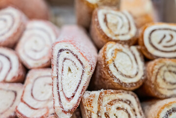 Turkish delight or lokum, halgoum is a family of confections with starch and sugar. Premium turkish delight. Famous turkish and greek sweet dessert. Turkish delight close up shot of colorful sweets.