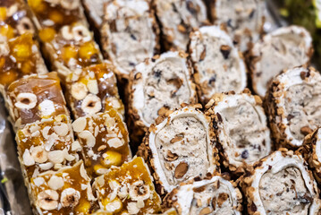 Turkish delight or lokum, halgoum is a family of confections with starch and sugar. Premium turkish delight. Famous turkish and greek sweet dessert. Turkish delight close up shot of colorful sweets.