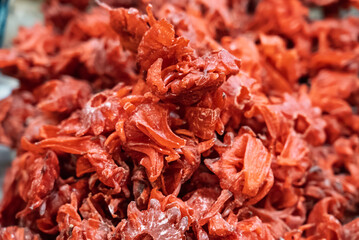 Dried colorful tropical fruits. Sweet fruits in dried form. Close up shot of dried sweet tropical fruits.