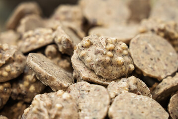 Chocolate cookies in icing. Chocolate sweets. Close-up shots of chocolate cookies.