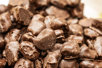 Chocolate cookies in icing. Chocolate sweets. Close-up shots of chocolate cookies.