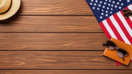 Obraz premium A photostock of a United States flag with a flat lay arrangement featuring travel accessories and a passport on a wooden background. High Quality