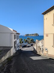 view of sea and island from seaside town