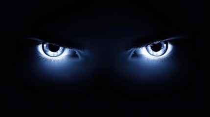 Mysterious Glowing Eyes Piercing Through Darkness with Intense Gaze