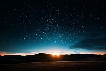 A stunning night sky filled with stars gradually transitions into dawn, illuminating the rolling hills below, creating a serene and enchanting landscape scene.