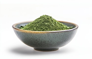 Green powder in a bowl showcasing its vibrant color and fine texture, perfect for smoothies and health drinks at a wellness-focused kitchen