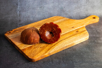 Jaggery made from date palm sap is a sweet, unrefined sugar with a rich, caramel-like flavour and dark brown color.