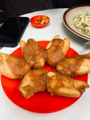 Pisang Goreng Kaya, a popular Indonesian snack of crispy fried bananas topped with kaya (coconut jam). A sweet and savory treat often enjoyed as a breakfast or afternoon snack.