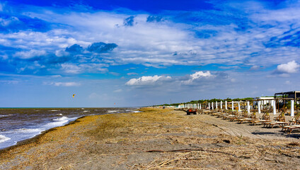 Panoramic photos on a windy day with rough sea of ​​the beach of Marina di Castagneto Carducci...