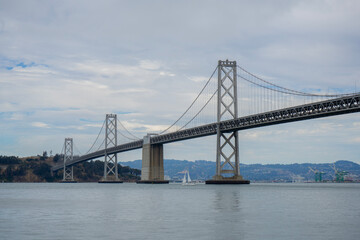 San Francisco Oakland Bay Bridge, California, United States on a cloudy day.