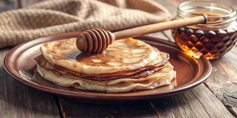 Homemade sweet pancake dressed with honey.
