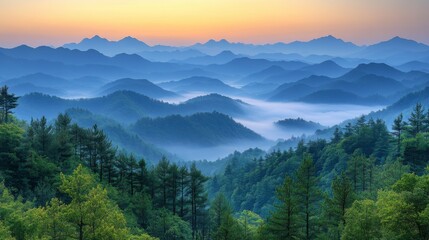Obraz premium Misty Mountain Ranges at Sunrise: A Breathtaking Landscape of Nature's Beauty