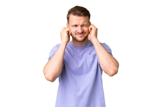 Young handsome caucasian man over isolated chroma key background frustrated and covering ears