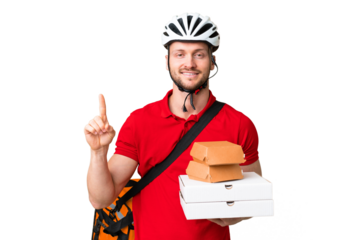 Young delivery man taking a takeaway food over isolated chroma key background showing and lifting a finger in sign of the best