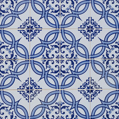 Fragment of building wall with colorful ceramic wall tiles. Azulejo close up. Abstract decorative background, textured ornate pattern for design or backdrop. Traditional ornate Portuguese architecture