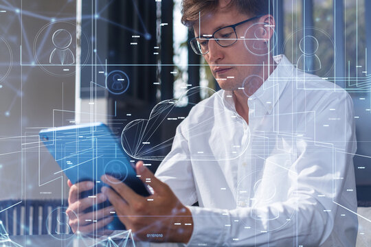 Man using tablet with digital cloud and network interface overla