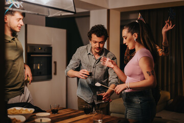 Close-knit friends enjoying a fun birthday celebration at home