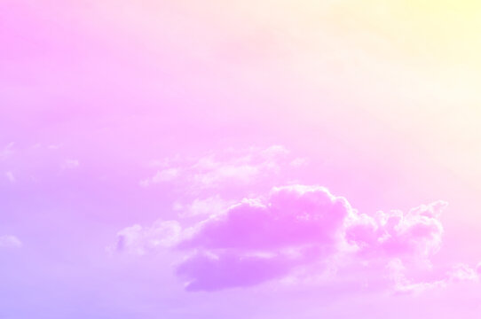 Pastel sky with soft white clouds. Fantastic color fantasy background. Sweet dreams