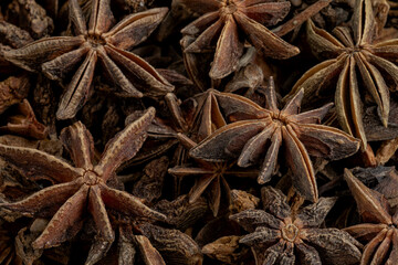 Close-up view of anise stars as background texture.