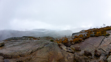 Foggy Mountain Landscape with Rocky Terrain