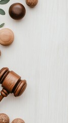 Classic wooden gavel with gold accents on a textured surface under natural light