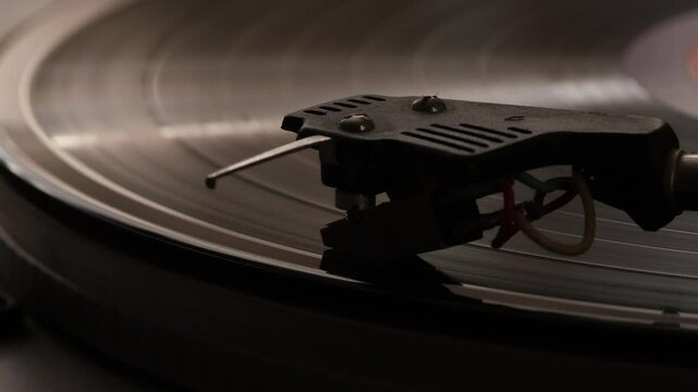 vinyl record player close up, vinyl record spinning in disc player