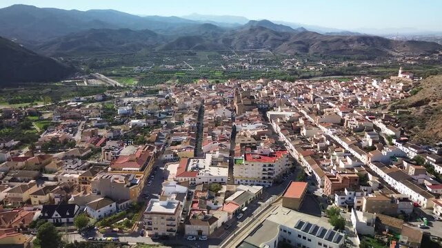 Flying over the Spanish rooftops of a Spanish Town    
