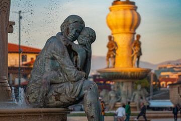 A bronze fountain sculpture in Skopje's Old Charshija, North Macedonia, surrounded by cultural...