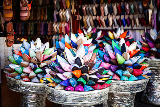 Colourful displays of babouche slippers in Marrakech market souk