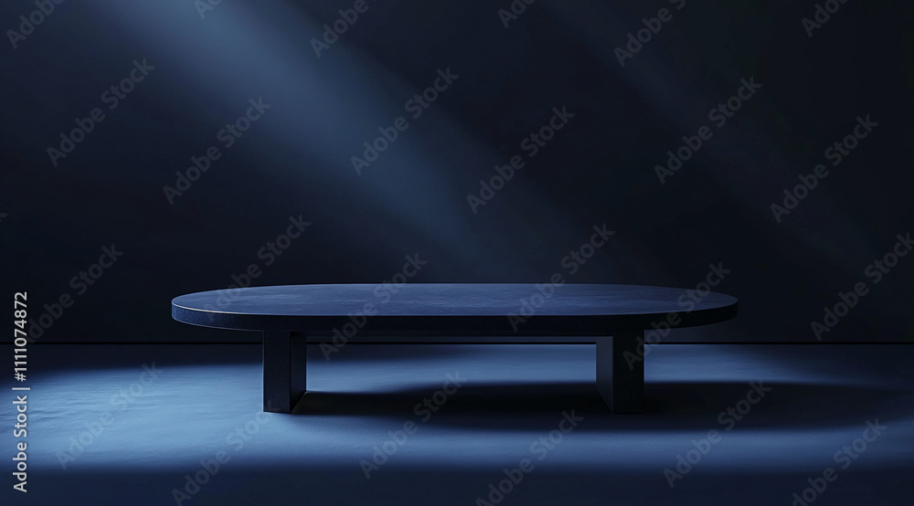 Poster spotlight illuminates a minimalist round table in a dark space, creating a dramatic contrast