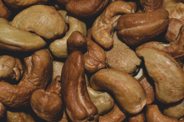 cashew nuts showcasing their rich golden-brown color natural textures healthy snacks nutritious advertisements packaging designs nut-based products  ingredient recipes cooking ethical eco-friendly