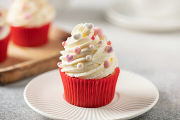 Red velvet cupcakes with whipped cream for Holidays