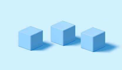 Obraz premium Three light blue cubes on a light blue background, casting subtle shadows.