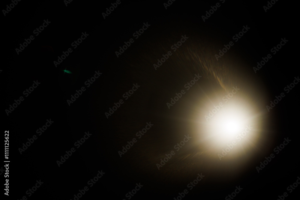 Leinwandbilder Easy to add lens flare effects for overlay designs or screen blending mode to make high-quality images. Abstract sun burst, digital flare, iridescent glare over black background.