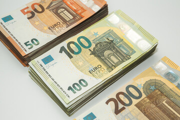 Euro banknote cash money. Lot of banknotes of European union currency close up. Financial investment, savings, income earnings concept.