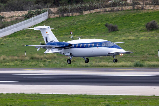 Luqa, Malta - December 1, 2024: Piaggio P-180 Avanti II (REG: D-IRBS) moments before touching down runway 31.