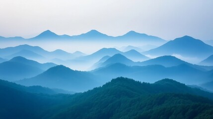 Fototapeta premium Misty Blue Mountains and Green Forest Landscape