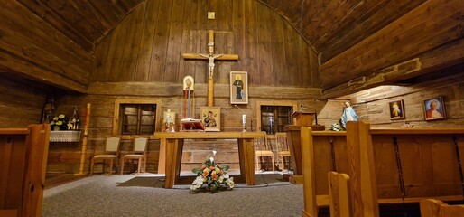 A wooden church made entirely of wood inside and facade made entirely of wood in Poland