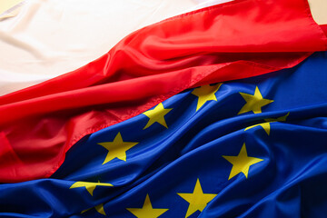 Flags of Poland and European Union, closeup