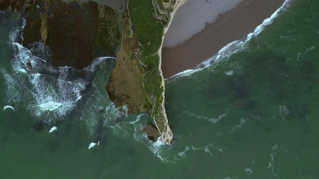 Aerial view of the famous white limestone cliffs near Etretat during sunset, France