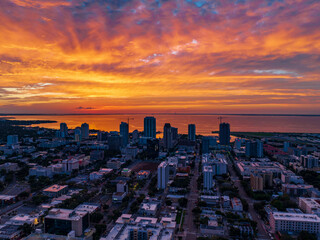 Sunrise on St. Petersburg Florida facing Atlantic Ocean explodes into orange color