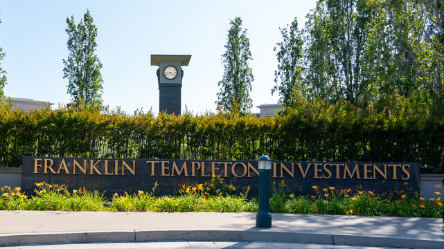 Franklin Templeton Investments ground sign at its office in San Mateo, California, USA - June 7, 2023. Franklin Templeton is an American global investment firm.