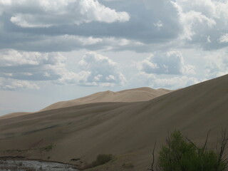 sand dunes and clouds