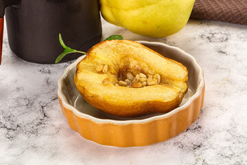 Baked quince with honey and cedar