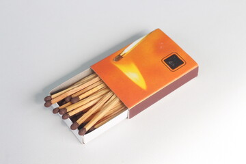 a box of wooden matches isolated on white background