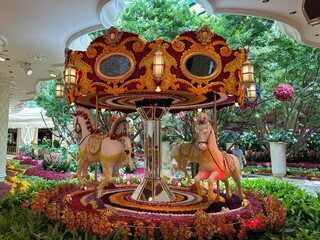 Ornate Carousel in Lush Garden at Wynn Hotel Las Vegas