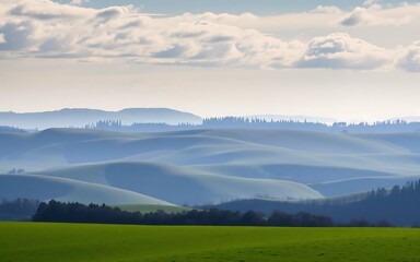 Obraz premium Serene green rolling hills landscape with distant trees and cloudy sky, concept for travel brochure, nature photography and landscape design