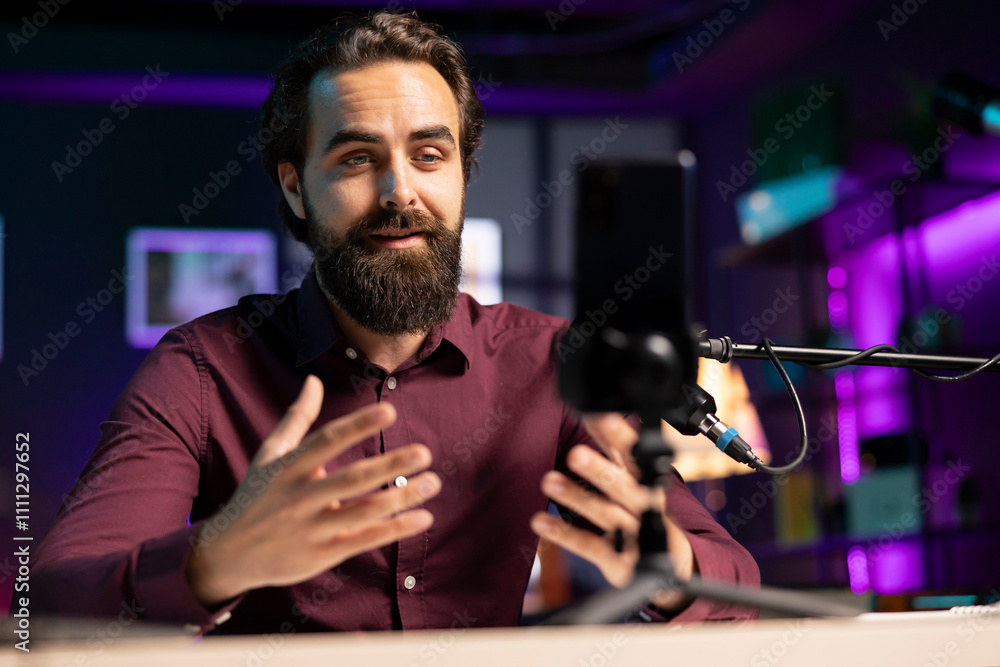Poster asmr content creator using quality mic and cellphone on tripod to do anti stress video, using whispe
